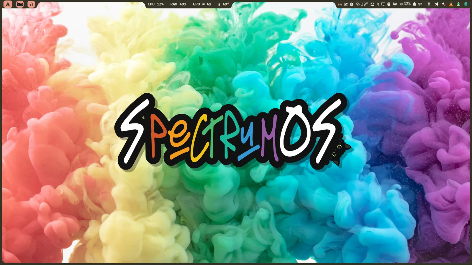Escritorio de SpectrumOS con un fondo de humo arcoíris, el logotipo de SpectrumOS y la barra superior
